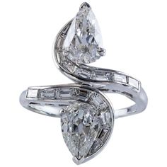 1950s GIA Certified Double Pear Shape Diamond Platinum Ring | From a unique collection of vintage fashion rings at https://www.1stdibs.com/jewelry/rings/fashion-rings/ Pear-shaped Single Cut Diamond Ring In Diamond White, Gia Certified Teardrop Diamond White Diamond Ring, Gia Certified Pear Diamond Ring, Gia Certified Silver Pear-shaped Diamond Ring, Gia Certified Pear-shaped Diamond Ring, Gia Certified Pear-shaped Silver Diamond Ring, Platinum Diamond Ring With Pear-shaped Accents, Vvs Clarity Pear-shaped Platinum Diamond Ring, Platinum Diamond Ring With Vvs Clarity, Pear-shaped