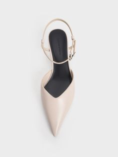 Keep it simple and classy with these pumps in soft cream. It features a timeless silhouette with a modern pointed-toed design that will flatter and elongate any frame. Featuring a distinctive crinkle effect and an ankle-strapped design, this pair exudes a sharp and polished aesthetic. Bonus points for the low kitten heels that offer a modest lift without compromising walkability. White Kitten Heels, Polished Aesthetic, White Kittens, Charles Keith, The Low, Keep It Simple, Kitten Heels, Pumps, Cream