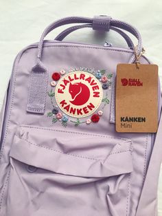 Custom embroidered Fjallraven Kanken with name. Perfect as a gift or as a school, daily, or travel bag! #gifts #kanken #backpack #school #cute #floral #embroidery #handmade #fjallraven Fljaraven Kanken, Kanken Mini Aesthetic, Kanken Backpack Aesthetic, Pink Kanken, Embroidered Kanken, Backpacks Aesthetic, Kanken Bag, Embroidery Aesthetic, Pretty Backpacks