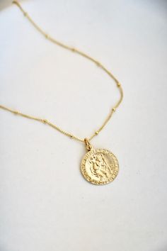 This necklace is inspired by Saint Christopher, the patron saint of travelers keeping them safe on their journey. Bring this necklace to wherever you go as a protection charm! 18" Gold filled satelite chain Gold filled St. Christopher Pendant St Christopher Necklace, Wishlist Ideas, St Christopher Pendant, St Christopher, Saint Christopher, Back Necklace, Studded Necklace, Kids Bracelets, Kids Necklace