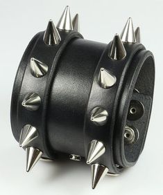 Cheap Edgy Wristband For Concerts, Cheap Punk Bracelets For Halloween, Cheap Gothic Spiked Jewelry, Cheap Spiked Jewelry For Concerts, Cheap Halloween Punk Bracelets, Cheap Silver Punk Wristband, Cheap Punk Wristband For Concerts, Spiky Bracelet Spikes, Spikey Bracelets