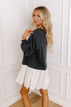 - This cutie is perfect for a cool, breezy day! With its cozy sweatshirt material and adorable pleated mini dress design, this piece will keep you looking stylish all season long. - Unlined sweatshirt material as well as soft, lightweight accent material at the skirt - A wide round neckline with a ribbed texture - Long sleeves with ribbed cuffs and unfinished rolled seam accents - An ivory colored pleated skirt - A relaxed silhouette that ends in a mini dress length hemline Mini Dress Design, Concert Fashion, Cool Breeze, Essential Dress, Sweater Jumpsuit, Pleated Mini Dress, Teacher Style, Ribbed Texture, Curve Dresses