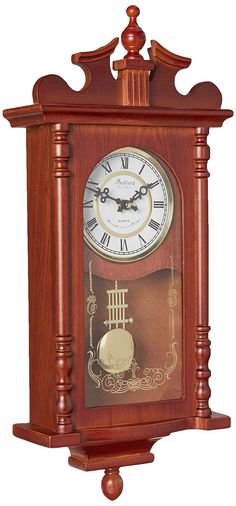 a wooden clock with roman numerals on the front and sides, in an ornate design