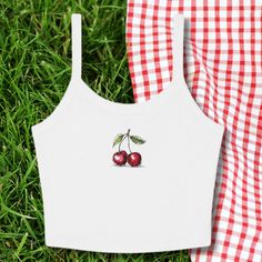 We love this fun, colorful Cherry design Baby Tank! This adult sized tank top is soft and super comfy and is made of 52% cotton and 48% polyester for a luxurious lightweight stretch. The designs are printed with DTF which delivers a vivid, detailed design with a textured feel. This tank is a perfect blend of coquette fashion and nostalgic Y2K vibes, making it a trendy addition to your casual wardrobe. Made with soft, comfortable material, it's ideal for everyday wear or for making a statement at Y2k Letter Print Tank Top For Spring, Y2k Style Letter Print Tank Top For Spring, Y2k Printed Tank Top For Spring, Summer Graphic Print Cami Top, Fitted Graphic Print Cute Tank Top, Y2k Printed Tank Top For Summer, Graphic Print Cami Tops For Summer, White Printed Camisole Top, Y2k Sleeveless Printed Tops