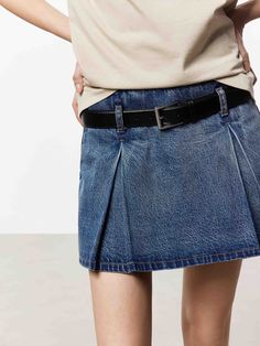 MO&Co. Women's Belt Pleated Denim Skort This stylish and versatile skort is made from a comfortable cotton blend material, ensuring breathability and ease of movement. Feature A-line mini silhouette creates a flattering shape and deep inverted box pleats, adding a touch of sophistication to the design. Combining the practicality of shorts with the polished look of a skirt, perfect for active days or casual outings. Features : - Mid-waist A-line skort silhouette- Deep inverted box pleats design- Casual Dark Wash Mini Skirt With Belt Loops, Workwear Short Cotton Denim Skirt, Short Cotton Denim Skirt For Work, Casual Dark Wash Denim Skirt With Belt Loops, Short Dark Wash Cotton Denim Skirt, Denim Blue Cotton Skort Of Short Length, Dark Wash Cotton Skort Casual Style, Denim Blue Cotton Skort In Short Length, Dark Wash Cotton Casual Skort