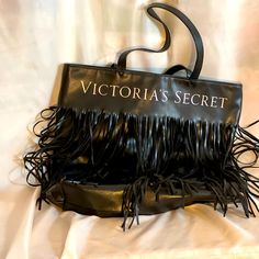 Victoria Secret Fringe Bag. Practically New Never Used Trendy Victoria's Secret Pouch Bag, Trendy Victoria's Secret Large Capacity Shoulder Bag, Trendy Large Capacity Victoria's Secret Shoulder Bag, Trendy Large Capacity Shoulder Bag From Victoria's Secret, Trendy Large Capacity Victoria's Secret Bag, Trendy Victoria's Secret Shoulder Bag With Removable Pouch, Victoria's Secret Black Travel Shoulder Bag, Trendy Rectangular Victoria's Secret Shoulder Bag, Victoria's Secret Black Shoulder Bag For Travel