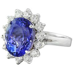 Stamped: 18K Total Ring Weight: 6.4 Grams Tanzanite Weight 7.30 Carat (13.45x10.30 Millimeters)Diamond Weight: 1.40 carat (F-G Color, VS2-SI1 Clarity )Face Measures: 19.15x16.10 Millimeter SKU: [600573] Luxury Oval Tanzanite Diamond Ring, Luxury Tanzanite Diamond Ring Gia Certified, Luxury Gia Certified Tanzanite Diamond Ring, Gia Certified Oval Tanzanite Diamond Ring, Luxury Tanzanite Gemstones For Formal Occasions, Gia Certified Tanzanite Oval Rings, Gia Certified Oval Tanzanite Ring, Formal Tanzanite Diamond Ring, Oval Shape, Formal Tanzanite Diamond Ring Oval Shape