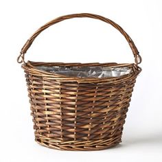 a wicker basket with silver foil in it