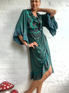 This is beautifull ruffled, over sized robe great summer cover up, on your holidays fits all sizes, loose and comfortable, made in light and flowy material, your must have holiday dress size L Thank You for looking Summer Bohemian Wrap Dress With Tie Waist, Blue Wrap Dress For Beach, Beach Wrap Dress With Kimono Sleeves For Summer, Summer Beach Wrap Dress With Kimono Sleeves, Bohemian Tie Waist Wrap Dress For Beach, Floral Print Wrap Dress For Beach, Bohemian Wrap Dress With Tie Waist For Beach, Bohemian Wrap Dress For Beach, Floral Wrap Dress For Beach