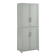 a tall white cabinet with two doors