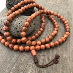 Unique and powerful Goldstone Japa mala Necklace from Nepal. A unisex piece that will be perfect for your day by day outfits and will be easy to match any other accessories. If it fits right can be a bracelet also. This is also a Buddhist praying 108 beads mala. The japa mala is 42.5cm- 16.75 inch long A unique addition to your jewelry collection. Enjoy Con salud Brown Spiritual Beads For Meditation, Spiritual Wooden Beaded Healing Bracelets, Bohemian 108 Beads For Rituals, Spiritual Healing Brown Beads, Spiritual Wooden Beads Necklace For Meditation, 8mm Spiritual Beads For Meditation, Bohemian Necklaces With 8mm Beads For Rituals, Spiritual Polished Beads For Meditation, Brown Bohemian Mala With 108 Beads