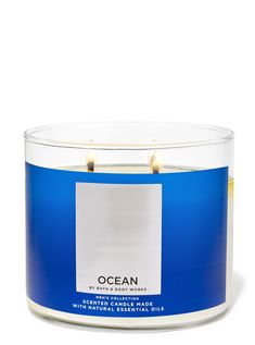 an ocean scented candle in a glass container