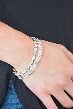 Infused with hints of silver, dainty white crystal-like beads are threaded along stretchy bands, creating whimsical layers across the wrist.

 Sold as one set of three bracelets. Bracelet Set Silver, White Bracelet, Platinum Jewelry, White Bracelets, Band Bracelet, Paparazzi Accessories, Stretchy Bracelets, Paparazzi Jewelry, Hello Beautiful