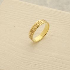 A stunning statement of love and devotion! Our Roman Numeral Ring is the perfect accessory for any special occasion, featuring a personalized inscription of your special date. A thoughtful and meaningful gift for any loved one, this custom ring makes for a memorable anniversary, birthday, or Mother's Day present. Personalized Yellow Gold Wedding Jewelry, Gold Meaningful Engraved Promise Ring, Meaningful Gold Engraved Promise Ring, Gold Engraved Promise Ring With Meaningful Style, Anniversary Rose Gold Engraved Ring, Engraved Promise Ring With Hallmark, Round Engraved Ring With Hallmark For Anniversary, Classic Engraved Ring With Hallmark As Gift, Adjustable Rose Gold Engraved Ring For Anniversary