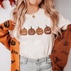 Pumpkins Halloween Shirt Explore Our Latest Collection Of Gildan 5000 T-Shirts, Combining Style, Versatility, And Exceptional Comfort! These T-Shirts Are Available In Sizes S To 3xl And Come In A Variety Of Vibrant Colors, Including Black, White, Sand, Green, Sport Grey, Red, Navy, And More. Made From Premium Materials, They Offer A Soft, Luxurious Feel And All-Day Comfort. Designed To Be Durable, They Maintain Their Shape And Color Even After Frequent Wear And Washing. Enjoy Fast And Reliable D Spirit Week Outfits, Halloween Clothes, Stay Spooky, Shirt Stays, Halloween Spooky, Shirt For Women, Neck Collar, Peta, Halloween Tshirts