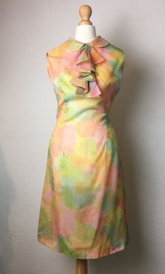 They don't come more vintage than this! Beautiful handmade 60s wiggle dress. Absolutely stunning. In excellent condition. A few stains on inner lining and some small snags to lining (shown in photos). Size uk 8 Yellow Vintage A-line Midi Dress, Multicolor Vintage Dress With Ruffles, Vintage Multicolor Ruffled Dresses, Vintage Multicolor Spring Dresses, Vintage Pink Midi Dress, Knee-length Summer Vintage Dress, Spring Vintage Dress For Garden Party, Knee-length, Retro Knee-length Vintage Dress For Garden Party, Knee-length Yellow Vintage Dress For Summer