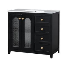 an image of a bathroom vanity with glass doors and gold knobs on the drawers