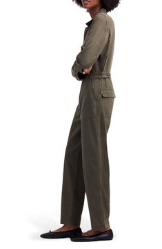 Vintage inspired in a garment-dyed denim, these long-sleeve coveralls feature utility patch pockets, a concealed-zip front and slim, tapered legs. 27" inseam; 16" leg opening Hidden front-zip closure Notched collar Long sleeves with button cuffs Chest flap-patch pockets; back flap-patch pockets 61% cotton, 39% Tencel® lyocell Tencel lyocell is a more-sustainably produced fiber made with closed-loop processing Machine wash, tumble dry Made in Turkey Utility Overalls With Patch Pockets For Fall, Khaki Utility Overalls For Workwear, Fall Utility Denim Jumpsuit With Side Pockets, Long Sleeve Cotton Denim Utility Jumpsuit, Long-sleeve Cotton Denim Utility Jumpsuit, Fall Workwear Overalls With Pockets, Khaki Fall Overalls, Fall Season Khaki Overalls, Denim Overall Jumpsuit With Side Pockets For Fall