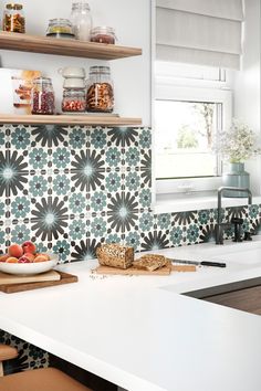 the kitchen counter is clean and ready to be used for cooking or baking, as well as other items