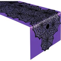 a purple table cloth with black spider webs on the top and bottom, in front of a white background