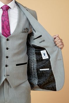 This stylish three-piece suit for men will be a popular option for weddings and formal events. Prince of Wales check is a traditional formal pattern, and the addition of elastane makes it comfortable and flexible all day. The silver light grey colour blends in wonderfully with any formal occasion. Model wears size 38R blazer, 38R waistcoat & 32R trousers. Features Slim fit Single-breasted waistcoat Prince of Wales check Notch lapel Single back vent Four button cuff Double button blazer fastening Formal Tweed Three-piece Suit With Notch Lapel, Elegant Gray Fitted Three-piece Suit, Tailored Tweed Three-piece Suit Single Breasted, Gray Three-piece Suit With Notch Lapel, Formal Gray Three-piece Single Breasted Suit, Sky Blue Colour, Prince Of Wales Check, Suit For Men, Checked Trousers