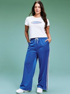 Sporty Pants With Elastic Waistband For Elevated Casual, Athleisure Bottoms With Contrast Trim For Loungewear, Casual Spring Joggers With Side Stripes, Casual Sweatpants With Side Stripes For Spring, Casual Spring Sweatpants With Side Stripes, Sporty Ankle-length Pull-on Sweatpants, Stretch Casual Pants With Side Stripes, Jogging Bottoms With Side Stripes, Casual Wide-leg Joggers With Elastic Side Panels