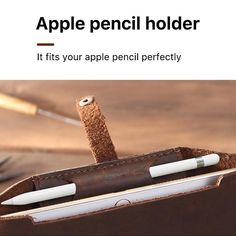 an apple pencil holder with two pens in it's center and the words, it fits your apple pencil perfectly