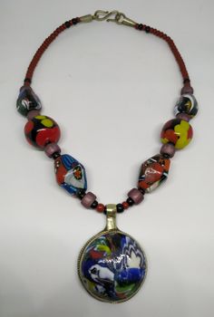 "Welcome! 60's, Vintage, Glass, Millefiori And multicolor Necklace Really special item, with quality In good vintage condition! Measures: - Pendant: 1.37\" x 1.57\" (3,5 cm x 4 cm) - Necklace: total long 9.44\" (24 cm) - Measure total: 20.86\" (53 cm) Thanks for stopping by!IMPORTANT: Due to the delicate situation We're all going through, and in order to keep the safety of courier workers too, all orders will be dispatched when alert sanitary finished. You can purchased or reserve items like alw Multicolor Round Glass Jewelry, Multicolor Murano Glass Necklaces With Large Beads, Multicolor Murano Glass Necklace With Large Beads, Multicolor Murano Glass Necklace With Polished Beads, Vintage Multicolor Jewelry With Large Beads, Handmade Vintage Multicolor Beads, Gems, And Cabochons, Artisan Multicolor Czech Glass Beaded Necklaces, Vintage Multicolor Beaded Necklaces, Vintage Multicolor Necklaces With Colorful Beads