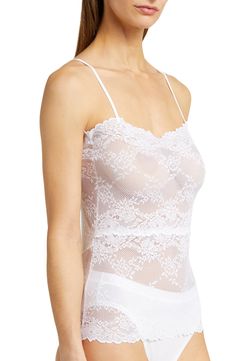 Lovely stretch lace brings romance to this square-neck cami designed with slinky adjustable straps. Square neck Adjustable straps 85% nylon, 15% Lycra® elastane Hand wash, line dry Imported Fitted Lace Camisole With Built-in Bra, Lace Camisole With Adjustable Straps, Fitted Lace Camisole With Tank Straps, Fitted White Tank Top With Delicate Lace, Elegant White Lace Top With Delicate Straps, White Lace Top Stretch Camisole, Stretch Lace Camisole With Straps, White Stretch Lace Top Camisole, Lace Tank Top With Adjustable Spaghetti Straps