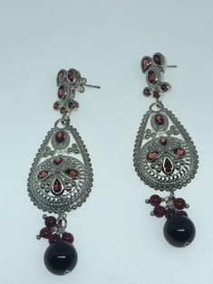 Vintage 925 Sterling Silver Bohemian Garnet dangle Chandelier Earrings Lovely handmade silver work About 2.5 inch 92.5% Sterling Silver All jewelry is shipped free in the US in a nice gift box. Check out our over a THOUSAND great reviews Sterling Silver Festive Dangle Chandelier Earrings, Sterling Silver Dangle Chandelier Earrings For Festive Occasions, Sterling Silver Festive Drop Chandelier Earrings, Traditional Sterling Silver Teardrop Chandelier Earrings, Traditional Teardrop Sterling Silver Chandelier Earrings, Festive Silver Filigree Danglers, Festive Sterling Silver Chandelier Earrings, Festive Sterling Silver Chandelier Earrings For Pierced Ears, Silver Pierced Chandelier Earrings For Festive Occasion