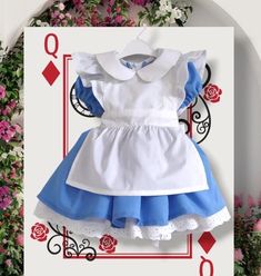 Celebrate your little one's special day with our Classic Alice in Wonderland Birthday Dress. Inspired by the beloved character, this dress is perfect for birthday parties, costume events, and imaginative play. Bring a touch of Wonderland magic to your child's wardrobe with this enchanting dress. Order now and make their birthday unforgettable! **Features - Classic design inspired by Alice in Wonderland - Perfect for birthday parties, themed events, and cosplay - This apparel will fit perfectly f Fitted Fairytale Costume For Dress-up, Princess Style Dresses With Ruffles For Cosplay, Cute Costume Dress For Cosplay Events, Fairytale Ruffle Dresses For Cosplay, White Fairytale Dress For Costume Party, Cute Snow White Dress For Dress-up, Snow White Princess Dress For Cosplay Events, Princess Style Dress For Cosplay Events, Themed Dresses For Costume Party And Cosplay Events