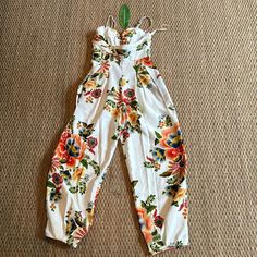 Farm Rio Jumpsuit. Never Worn. Small Dark Stain From Shipper. Can Easily Be Treated Or Cleaned From Dry Cleaner. White Cotton Jumpsuits And Rompers With Floral Print, Spring Yellow Cotton Jumpsuits And Rompers, Yellow Cotton Jumpsuits And Rompers For Spring, Yellow Floral Print Summer Jumpsuits And Rompers, Yellow Fitted Cotton Jumpsuits And Rompers, Yellow Floral Print Summer Jumpsuit, Chic Cotton Floral Print Jumpsuits And Rompers, Fitted Yellow Jumpsuits And Rompers With Floral Print, Fitted Yellow Floral Jumpsuits And Rompers