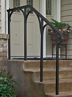 a set of stairs leading up to a front door