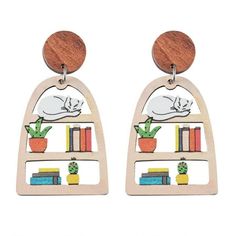 New products arrive,welcome to buy!!! Graduation Season To School Season Book Cabinet Potted Plant Cat Hollowed Out Splicing Wooden Double Earrings Teacher's Day Gift Features: This book bookshelf potted cat hollowed out wooden double-sided earring is a unique gift for graduation,to school,and Teacher's Day,showcasing good wishes for education and growth. The earrings are made of exquisite wooden material,with a hollow design that brings a unique artistic sense.The double-sided design to its uni Book Bookshelf, Initial Earrings Studs, Book Cabinet, Double Sided Earrings, Double Earrings, Teachers Day Gifts, Jewelry Making Earrings, Gold Earrings For Women, Initial Earrings