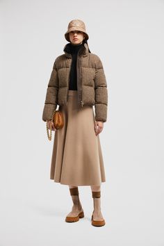 Inspired by timeless fashion, this skirt is crafted from a luxurious blend of Merino wool and cotton. Style with warm knits and refined puffers for a sophisticated winter look. Chic Winter Wool Skirt, Chic Wool Skirt For Winter, Sweatpants For Women, Personalized Jacket, Winter Skirt Outfit, Cotton Midi Skirt, Latest Skirts, Winter Skirt, Cardigan Shirt