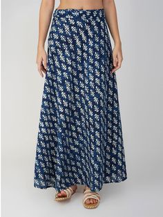 Indulge in the sheer comfort and beauty of our Veronica printed skirt tailored from the finest cotton fabric. Its wrap-around silhouette and free-size design make it easier for you to customize its A-line fit. Featuring a bright indigo canvas with white motifs, this versatile skirt is thoughtfully handcrafted with batik print. It is an Indonesian technique of wax-resist dyeing that involves the usage of beeswax and natural vegetable dyes. Having said that, with this contemporary and timeless pie Blue A-line Cotton Bottoms, Cotton Flowy Maxi Skirt With Lined Skirt, Cotton Flowy A-line Skirt, Flowy Cotton Maxi Skirt With Lining, Flowy Flared Cotton Maxi Skirt, Flowy Cotton Maxi Skirt With Lined Skirt, Cotton Flared Maxi Skirt, Summer Cotton Skirt In Indigo, Cotton A-line Maxi Skirt With Gathered Detail