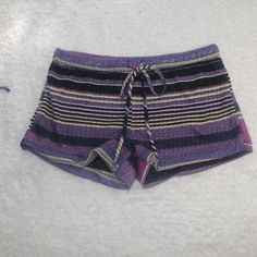 Allover Patterned Print, Elasticized Waistband With Drawstring, Woven Construction, Lined Shorts. Colors Include Three Different Shades Of Purple, Black, White, And Yellow For Accent. Due To The Nature Of The Pattern, No Two Shorts Will Look Alike. Nwt Never Been Worn Purple Beachwear Shorts For Beach Season, Purple Cotton Beach Bottoms, Purple Cotton Bottoms For Beach, Beach Shorts With Elastic Waistband In Purple, Summer Beach Shorts In Purple, Purple Summer Shorts For Vacation, Purple Bottoms For Beach Vacation, Purple Beachwear Shorts For Beach, Purple Bottoms For Vacation Beach Season