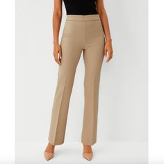 Ann Taylor The Side Zip Trouser Pant Size: 2 Color: Whiskey Cream Endlessly Sleek, Our Side Zip Trouser Pants Are Designed To Flatter In All The Right Places. Elasticized Waist. Hidden Side Zip With Hook-And-Eye Closure. Regular Fit: Lean Through The Hip And Thigh High Rise: Sits 1/2" To 1" Below Natural Waist Full Length: 31 1/2" Inseam With 20" Leg Opening Trouser: A Pant With A Bit Of Flare That Lengthens Legs 96% Polyester, 4% Spandex Machine Washable New Without Tags. Original Retail Price: Beige Stretch Bottoms For Office, Beige Stretch Straight Dress Pants, Beige Stretch Business Casual Pants, Beige Stretch Dress Pants For Business Casual, Fitted Khaki Bottoms For Office, Khaki Bottoms For Office, Stretch Khaki Bottoms For Workwear, Beige Stretch Bottoms For Business Casual, Fitted Beige Ankle-length Pants