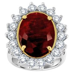 This one-of-a-kind ring features a rare un-heated natural 9.67 carat Red Ruby oval shape circled by eighteen (18) brilliant round diamonds and two rows of round diamond micro-prong set on a split shank band. The Ruby is deep red color and has some inclusions that blend nicely throughout the gem. The band is 2.8 mm wide. The Ruby is GIA certified. Certificate number 5211628195 The diamond's weight on the ring is 2.26 Carat. Average color G Average clarity SI1 size- 6.5 It can be resized to any fi African Inspired Jewelry, Royal Ruby, Ruby Jewel, Real Diamond Necklace, African Jewelry, Minerals And Gemstones, Split Shank, Red Ruby, Yellow Sapphire