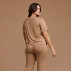 Feel nuud in our cooling pajama top and pant set. Curated with your comfort in mind, this breathable set will move with you throughout the night and on your DND (Do Not Disturb) days. Model Dimensions: Kara is 5?10? and wearing size L.Bust: 43?Waist: 34?Hips: 47? Stretch Tops For Loungewear, Versatile Stretch Tops For Loungewear, Versatile Seamless Tops For Loungewear, Basic Stretch Cropped T-shirt For Loungewear, Short Sleeve Crew Neck Top For Loungewear, Relaxed Fit Ribbed Top, Versatile Seamless Crop Top For Loungewear, Basic Cropped T-shirt For Loungewear, Comfortable Relaxed Fit Ribbed Top