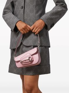 light pink leather signature Horsebit detail front flap closure detachable shoulder strap interchangeable strap main compartment canvas lining silver-tone hardware This item is in size UNI and the color is Pink Gucci Bags With Metal Hardware For Work, Gucci Shoulder Bag With Adjustable Strap For Office, Gucci Flap Travel Bag, Gucci Flap Bag For Travel, Gucci Bag With Silver-tone Hardware For Everyday Use, Modern Gucci Shoulder Bag With Detachable Strap, Gucci Shoulder Bag With Silver-tone Hardware For Office, Gucci Flap Bag For Everyday Use, Designer Gucci Flap Bag