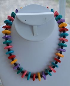 "Pretty and colorful is this multi-colored square plastic beaded necklace. The necklace has black spacers beads and measures 17\" in length. It is in very good vintage condition with minor wear. I see one small chip on a red bead. This is a fun, cheery necklace will be a nice addition to your summer jewelry collection!" Red Bead, Plastic Beads, Necklace Vintage, Summer Jewelry, Spacer Beads, Vintage Necklace, Multi Colored, Etsy Vintage, Jewelry Collection