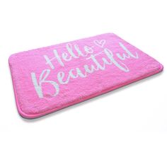 a pink towel with the words hello beauty written on it