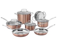 a set of pots and pans with lids