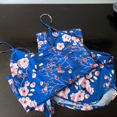 Pajama Set Blue With Pink Cherry Blossoms Size Small Bottoms Have Elastic Waistline Top Has Adjustable Straps And A Tie Back That’s Slightly Open New With Tags Never Worn From South Moon Under Pink Gym, Sports Bra Set, Satin Pj Set, Christmas Flannel, Flannel Pajama Pants, Classic Pajamas, Tie Waist Shorts, Flannel Pajamas, Purple Satin