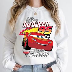 Disney Pixar Lightning Mcqueen 95 Seven Time Champ T-shirt White Disney Crew Neck T-shirt, Disney Fan Merchandise Crew Neck Sweatshirt, Disney Crew Neck Sweatshirt Fan Merchandise, Disney Crew Neck Sweatshirt For Fans, White Disney Crew Neck Sweatshirt, Sublimation Print Crew Neck T-shirt For Disney Fan Events, White Letter Print Sweatshirt For Disney Fan Events, White Letter Print Sweatshirt For Disney Events, Crew Neck T-shirt With Sublimation Print For Disney Fans