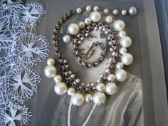 A 1930's Art Deco glass pearl and rolo link chain choker necklace. The beads range in size from 4mm to 12mm round. The length of the necklace measures 15'' long total. These pearls have some real weight to them. In very beautiful condition with warm patina. Vintage Pearl Jewelry With Beaded Chain, Vintage Pearl White Pearl Chain Jewelry, Vintage Wedding Jewelry With Beaded Chain, Vintage Pearl Chain Necklace Gift, Vintage Pearl Necklace With Beaded Chain As Gift, Vintage Pearl Chain Necklace For Gift, Vintage Pearl Necklace With Chain As Gift, Vintage Pearl Chain Necklace As Gift, Vintage Round Pearl Chain Necklace