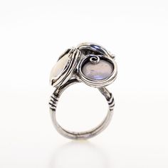 Unique sterling silver ring with 3 coin pearls (12 mm) inlaid. This large breathtaking Pearl ring, a perfect gift for women, inspired by the underwater life from Porans Dimensions: Max Width:1.06 inches Please contact me with any questions. our jewelry shop on Etsy: http://www.etsy.com/shop/Porans Thank you for Visiting Our shop Please visit my shop policies for additional information Elegant Adjustable Opal Ring Nickel-free, Unique Nickel-free Round Opal Ring, Unique Nickel-free Moonstone Ring, Elegant Wire Wrapped Round Rings, Cabochon Pearl Ring In Sterling Silver, Silver Pearl Ring With Cabochon, Nickel Free Elegant Opal Ring, Elegant Nickel Free Opal Ring, Elegant Silver Wire-wrapped Crystal Ring