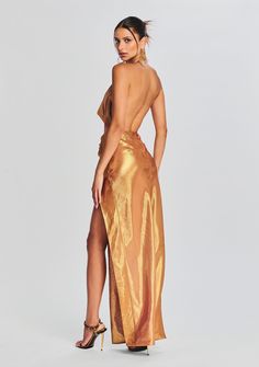 Dare to shine in our Cleo Dress. This cowl neck halter dress features a pleated detail at the hip and an ultra side slit. Shown here in Nude Glitter. 72% Silk, 28% Metallic Made in China Model is 5'10" wearing size S Style No. PF23-7060 Neck Halter Dress, Silk Chiffon Dress, Halterneck Dress, Gold Dress, Silk Chiffon, Long Length, Chiffon Dress, Night Dress, Cocktail Party