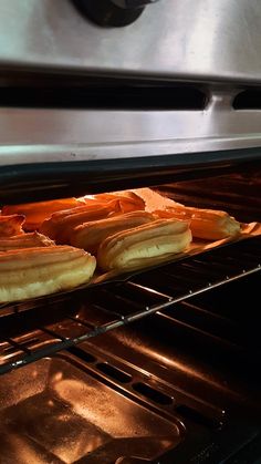 some food is cooking in an oven and it looks like they are going to bake